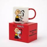 White ceramic Snoopy mug with red handle, Snoopy graphic on front