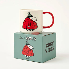 White Snoopy mug with Snoopy in red quilted jacket and red handle