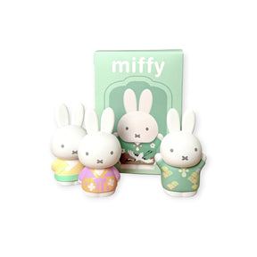 Three 6cm Miffy figures in pastel ancient-inspired costumes displayed in front of green-themed packaging box