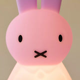 Pink Miffy mini light bunny figurine face with black eyes and X mouth