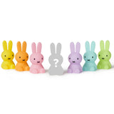 Lineup of Miffy mini light bunny figurines in several colors, including grey mystery