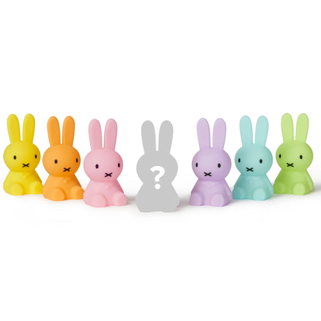 Lineup of Miffy mini light bunny figurines in several colors, including grey mystery
