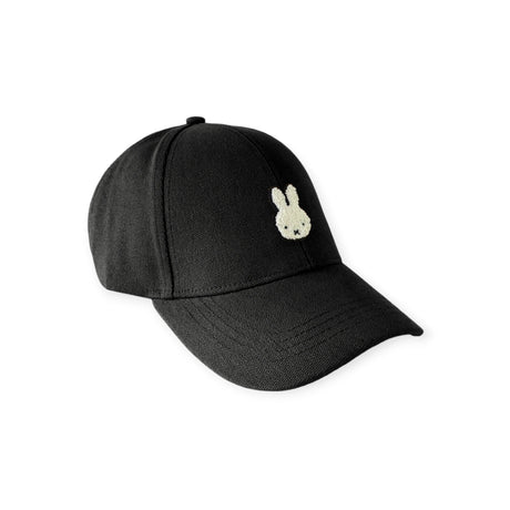 Side angle of black cap featuring a textured white Miffy Bunny embroidered on front panel against white background