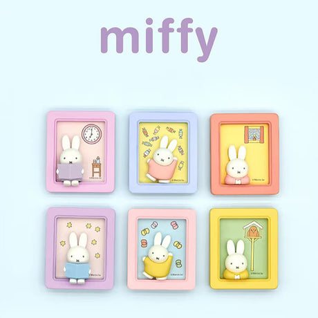 Six Miffy magnetic photo frames in pastel colors featuring bunny figures with playful themed backgrounds on light blue surface