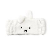 Enhance your skincare routine with the plush Miffy Bunny - Spa Headband by Miffy, featuring a cute bunny face and ears. It's perfect for keeping hair in place while adding fun to your daily regimen.