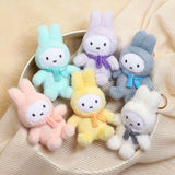 Pastel plush rabbit keychain with blue scarf and metal key ring
