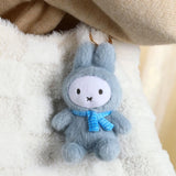 Light blue plush rabbit keychain with blue scarf and metal key ring
