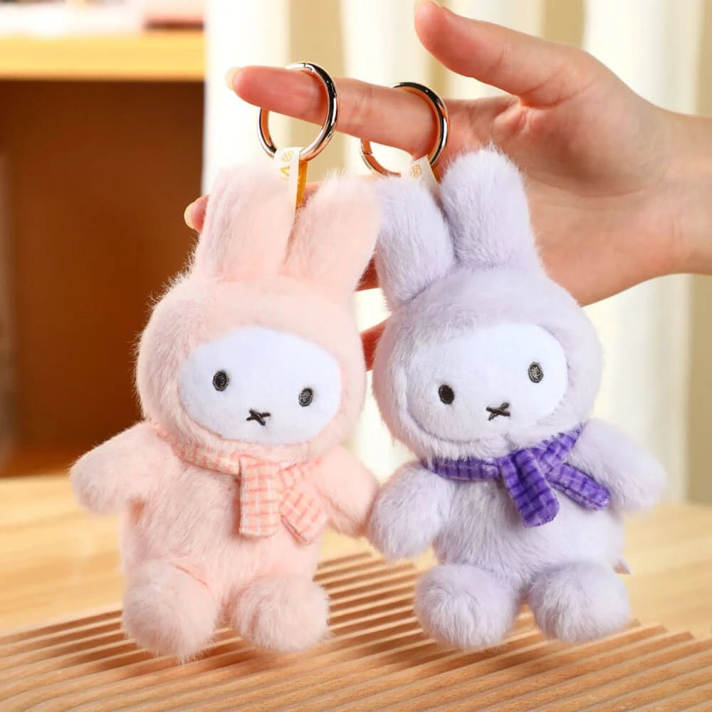 Pastel plush rabbit keychains with metal rings, pink and light purple