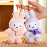 Pastel plush rabbit keychains with metal rings, pink and light purple