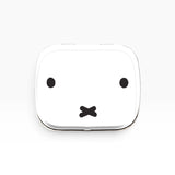 Miffy bunny pill tin with white lid and black bunny face design