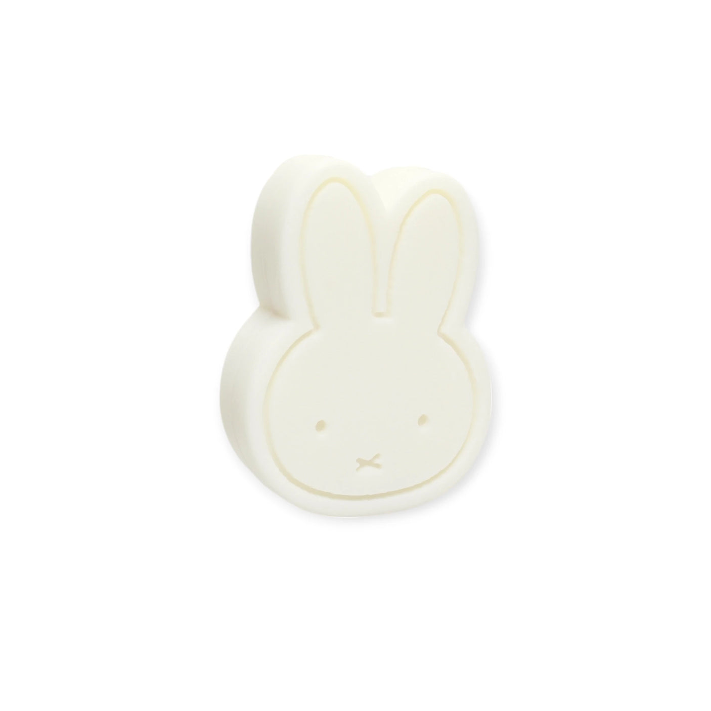 The Miffy Soap - Berry Parfum, shaped like a rabbit's head, rests on a white background, echoing the purity of vegan-friendly products.