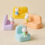 Set of phone stand sofas with three pastel rabbit figures