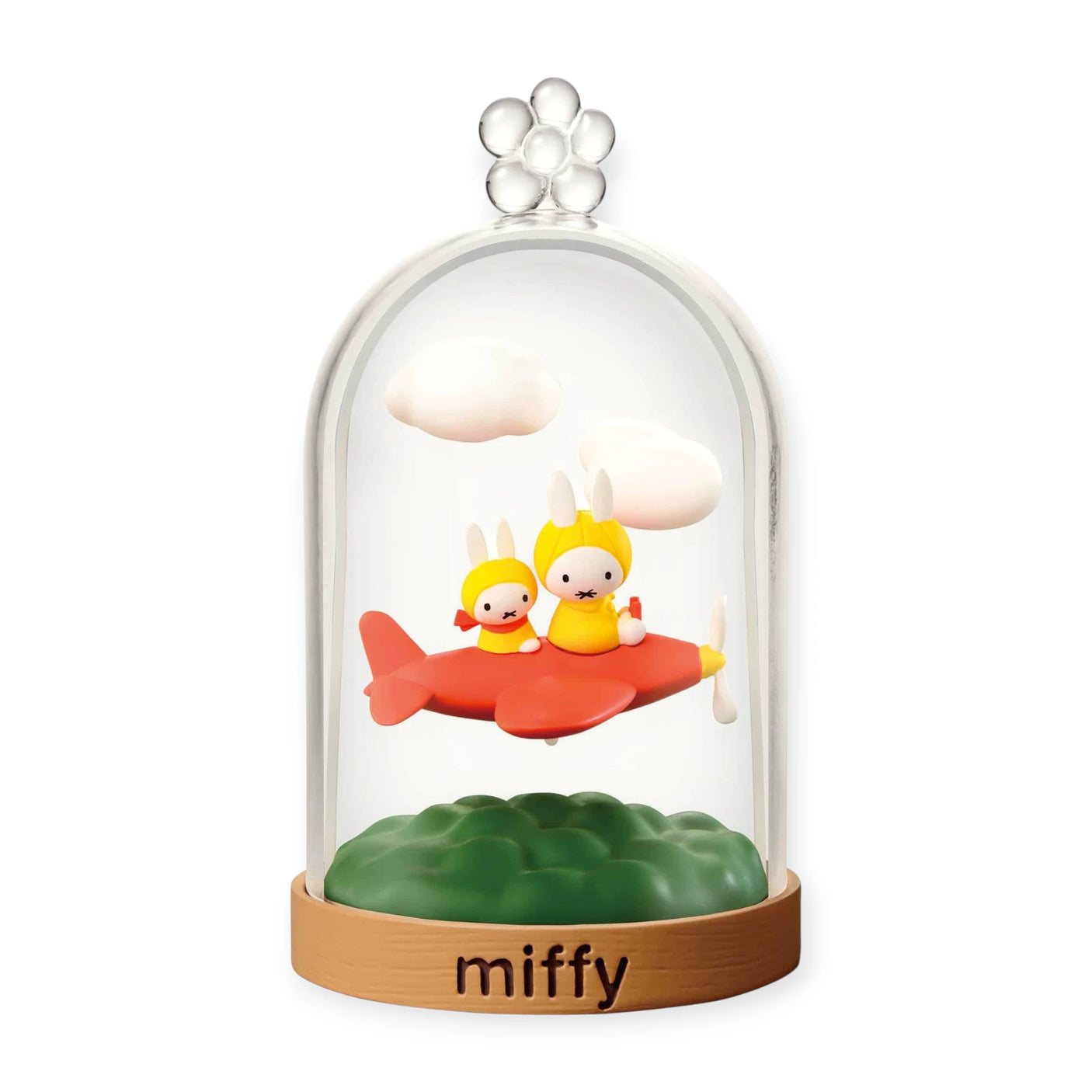 Miffy terrarium dome with two rabbits on a red sea creature and green base