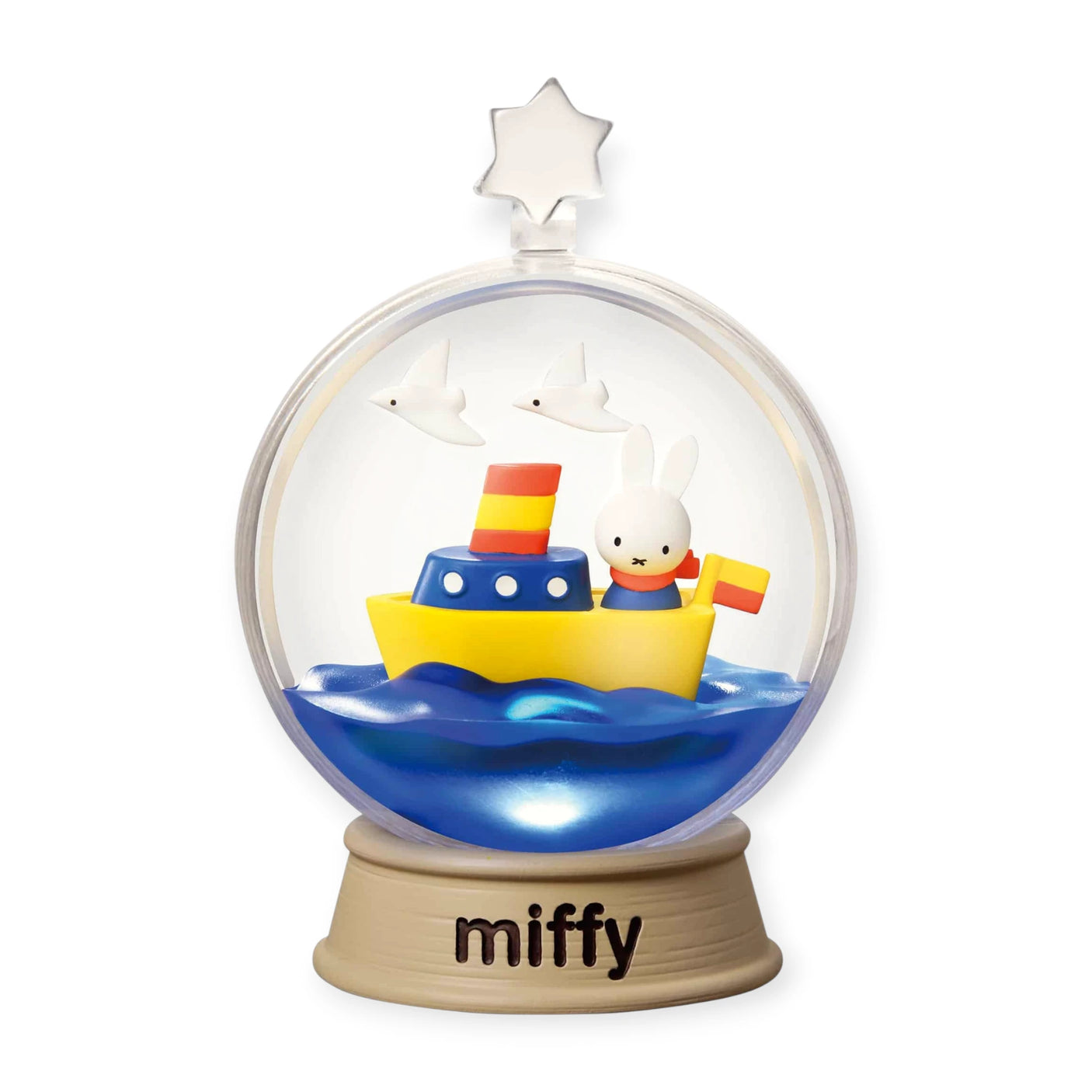 Miffy terrarium dome with blue boat on water and a little bunny, star topper
