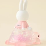 Rabbit blind box figure side view, pink top and translucent layered cone skirt