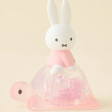 Rabbit blind box figure with pale pink skirt and transparent layered cone dress