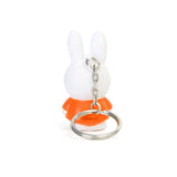 Charming Miffy Keychain - Classic, featuring an adorable white rabbit dressed in a vibrant orange outfit reminiscent of iconic colors, shown from the back. This delightful accessory adds charm to any collection, making it perfect for fans and collectors of the Miffy brand.