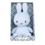 The environmentally conscious Miffy Quilted Plush Gift Box - Blue 23cm is thoughtfully presented in an ice blue patterned box, showcasing "the bonbon miffy label," making it an ideal gift for any occasion.