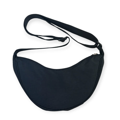 Back view of black Miffy Crescent Crossbody Bag showing smooth crescent shape and adjustable strap, gallery 1 image