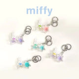 Collection of rabbit moon and star keychains with pastel charms and silver key rings