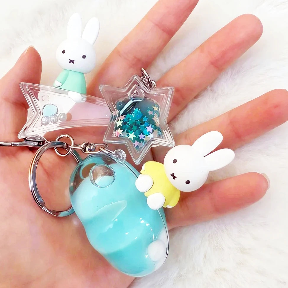 Rabbit keychain charm with turquoise moon body and glitter star in clear holder