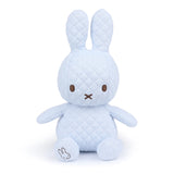 The Miffy Quilted Plush Gift Box in Blue, measuring 23cm, is a delightful light blue quilted plush bunny with embroidered eyes and nose. It features a charming small bunny logo on its foot and is carefully packaged in an elegant ice blue gift box, making it ideal for those looking for an eco-friendly touch.