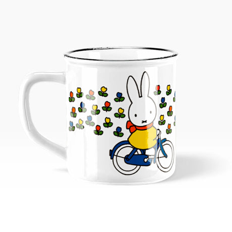 White ceramic mug with Miffy rabbit on bicycle and colorful flower pattern