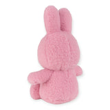 A charming, eco-friendly Miffy Plush Cotton Candy in Rose, measuring 23cm, captures hearts with its delightful pink bunny design and is seen facing away.