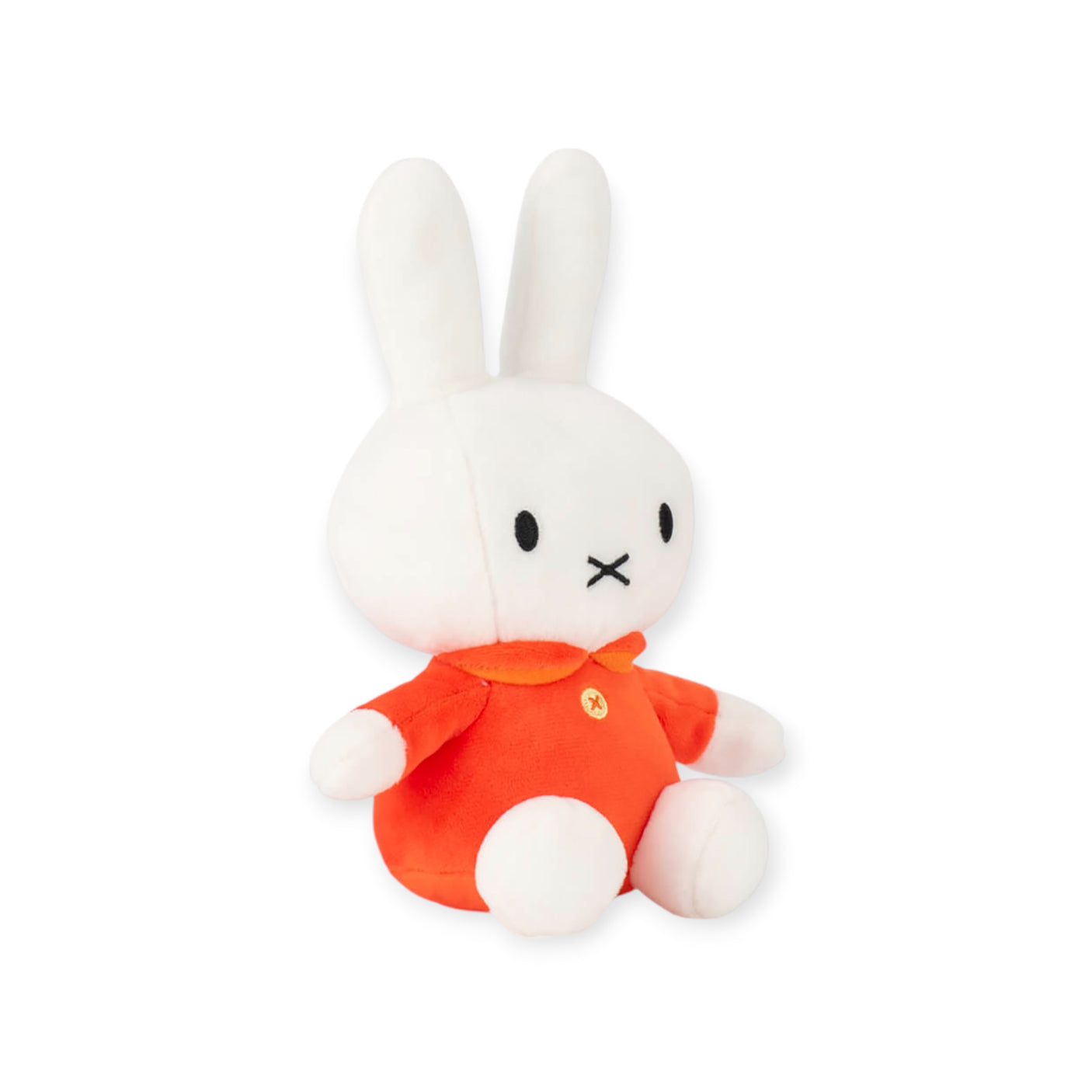 The Miffy Plush Classic Red - 20cm, a soft and cuddly rabbit with long ears dressed in a classic red outfit, is sitting upright against a plain background.