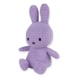 A Miffy Bunny Plush Corduroy in lilac, featuring black eyes and a small black "X" mouth, sits upright.