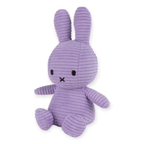 A Miffy Bunny Plush Corduroy in lilac, featuring black eyes and a small black "X" mouth, sits upright.