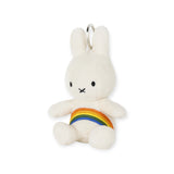 Discover the Miffy Rainbow Plush Keychain - 10cm, a charming white bunny from the Miffy brand, featuring a colorful rainbow stripe around its waist.