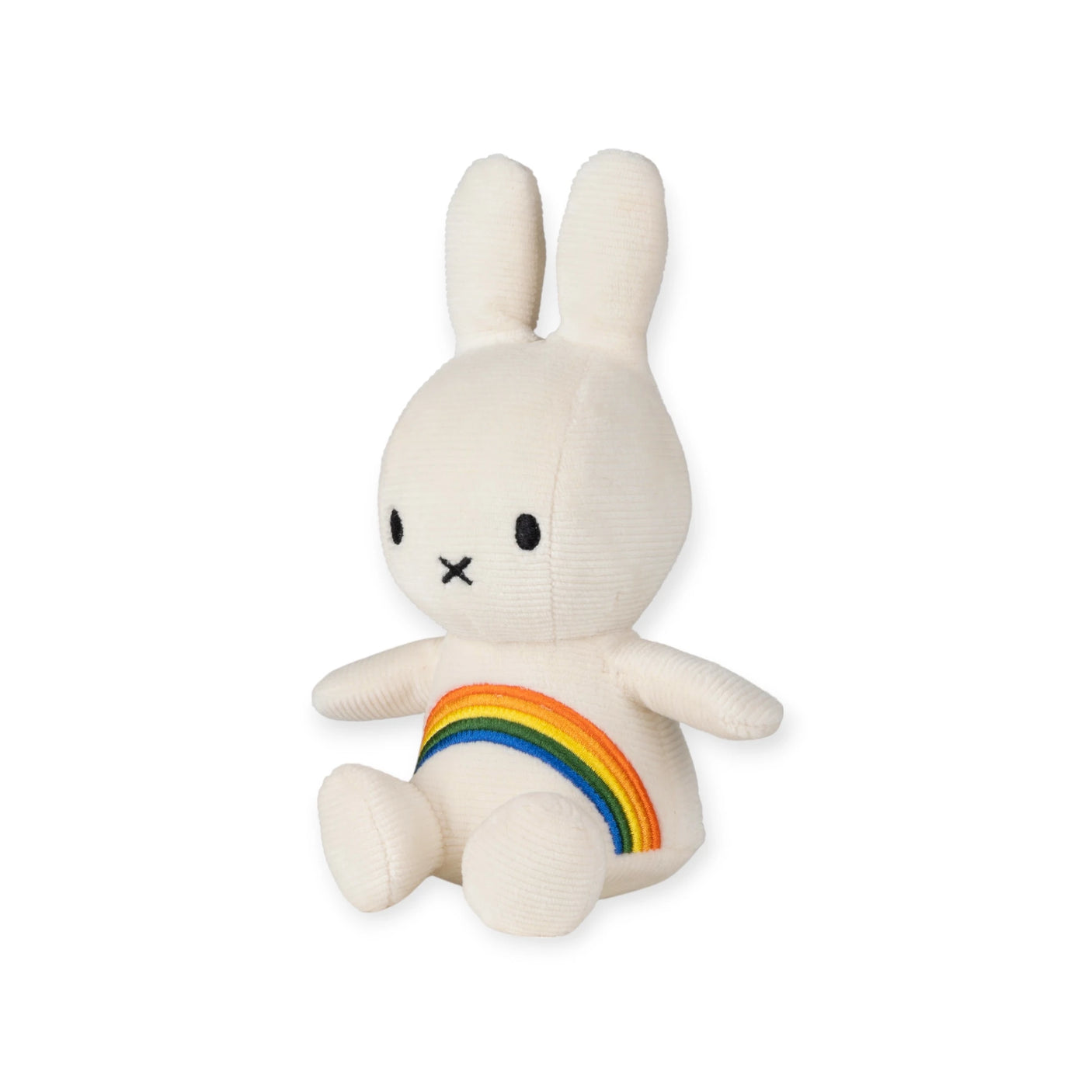 The Miffy Rainbow Plush - 18cm by Miffy is an ultra-soft white rabbit toy with black eyes, nose, and mouth. It sits upright with an embroidered rainbow on its torso against a plain background.