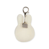 Miffy Squish Ball Keychain - White showing a soft white plush bunny keychain with metal clasp and Bon Ton Toys tag by Miffy