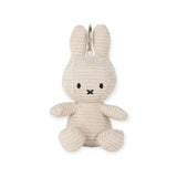 The Miffy Keychain Corduroy 10cm in Stone Grey features a plush rabbit with floppy ears, an embroidered face, and sits upright. This limited edition accessory from Miffy adds charm to any key set, perfect for fans and collectors.