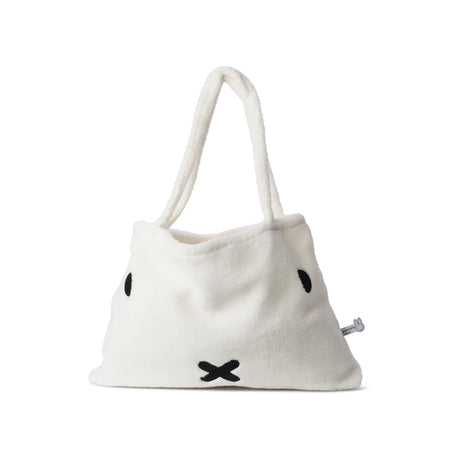 Introducing the Miffy Shopping Bag - Recycled Soft Terry by Miffy: a charming plush tote crafted from recycled terry material in white, featuring an adorable design with black eyes and a small X for a mouth. Ideal for those who appreciate sustainable fashion.