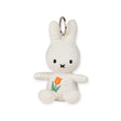 Introducing the Miffy Plush Tulip Keychain - 10cm by Miffy, a whimsical and sustainable accessory featuring a plush bunny with a simple face and charming tulip, perfect for personalized touches.