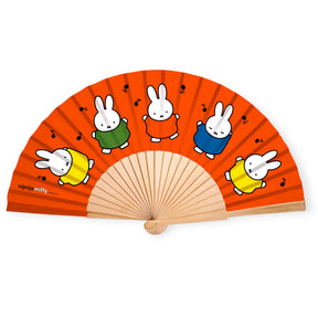 Miffy Bunny Music Hand Fan with colorful dancing Miffy figures on bright orange background, wooden ribs visible
