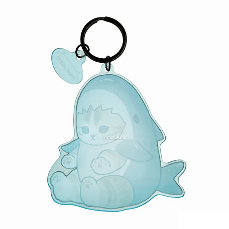 The Mofusand Shark Keychain by Mofusand features a cute cartoon cat in a light blue shark suit, crafted from translucent acrylic, and attached to a black keyring with a fish-shaped tag.