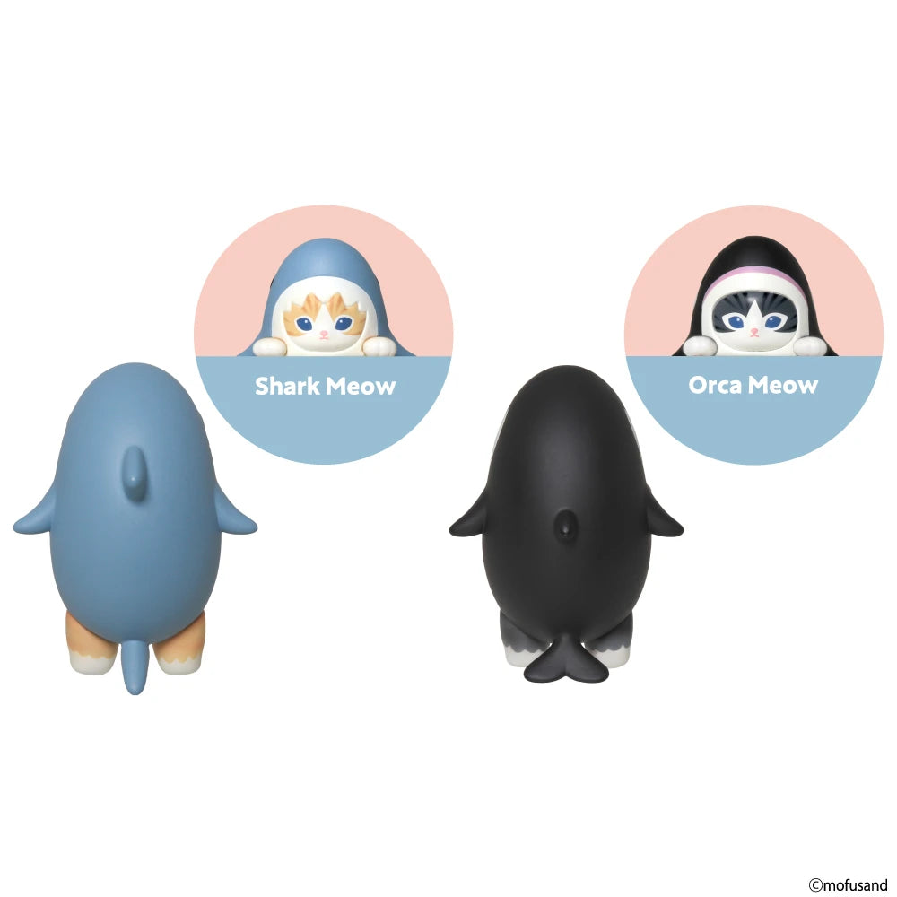 Two delightful figurines from the Mofusand Hippers Blind Box collection by Mofusand are styled as sea-themed characters: one is dressed as a shark and the other as an orca. The front view features their charming cat faces, while the back displays their full marine costumes.