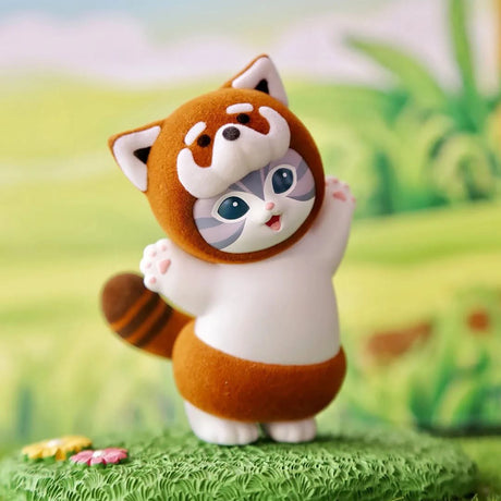 Orange-brown plush animal blind box figure with white belly, cat ears, and blue eyes