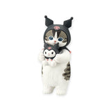 Black cat character blind box figurine holding a small white cat