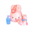 MOMO Bunny 24h Work Life Diary - Blind Box with pink bunny case, three mini bunny figures in pastel and translucent colors.