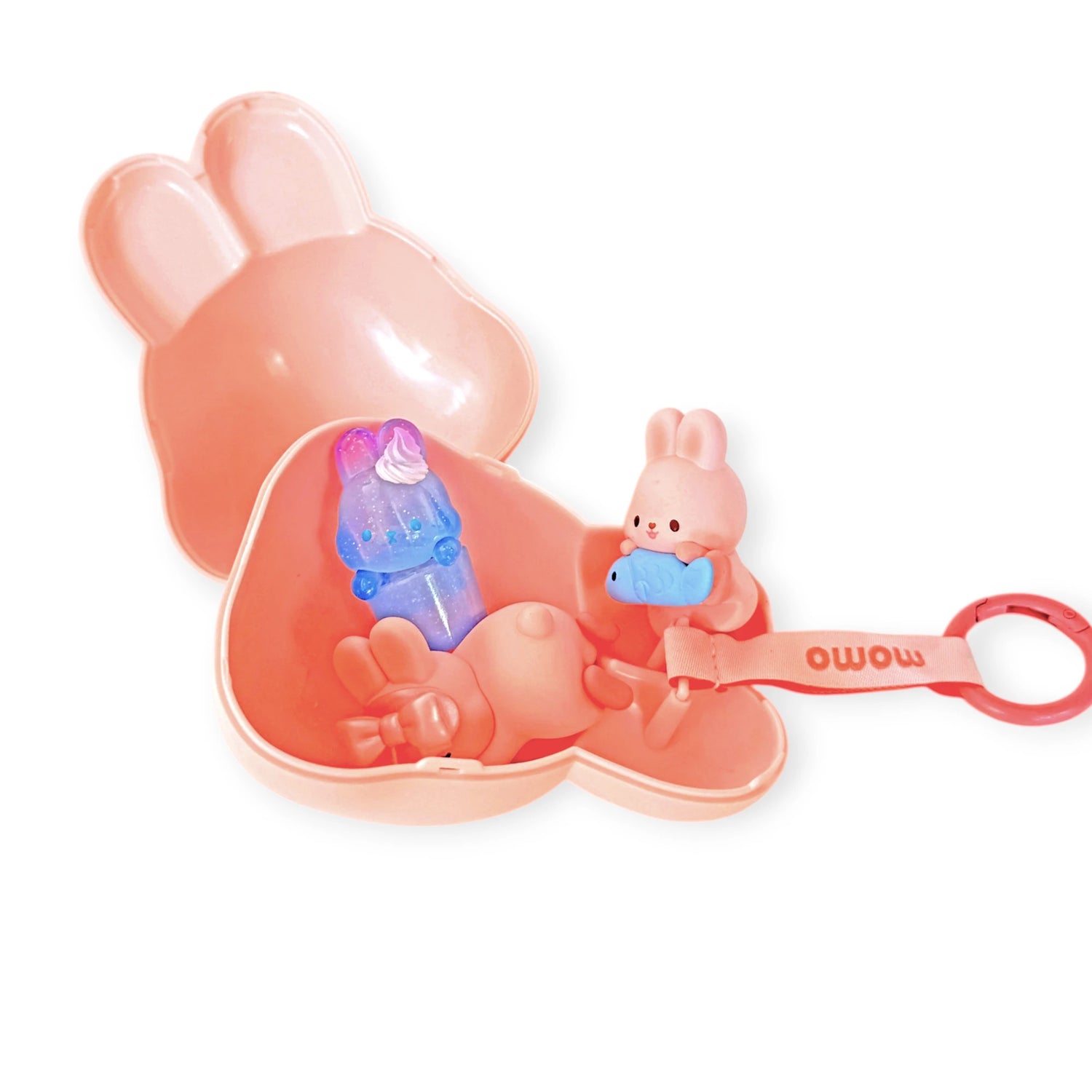 MOMO Bunny 24h Work Life Diary - Blind Box showing pink bunny case with two small bunny figures holding pastel items inside