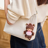 Plush bag charm of brown Bebichhichi character with pink collar on silver chain