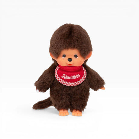 Monchhichi twin boy plush doll, dark brown fur, red plaid bib, orange feet
