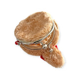 The Monchhichi Coin Pouch - BebeChichi by Monchhichi, featuring a plush, furry design with a metal clasp and small red bell, shaped like a spun coin purse, lays gracefully on a flat surface.