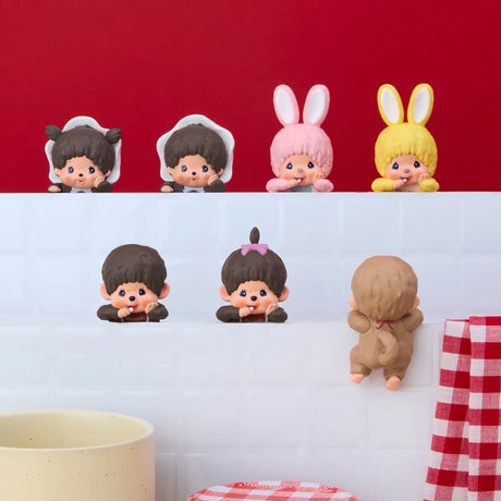 Seven Monchhichi Hippers figures in different animal costumes arranged on white tiles with a red backdrop, promo image two