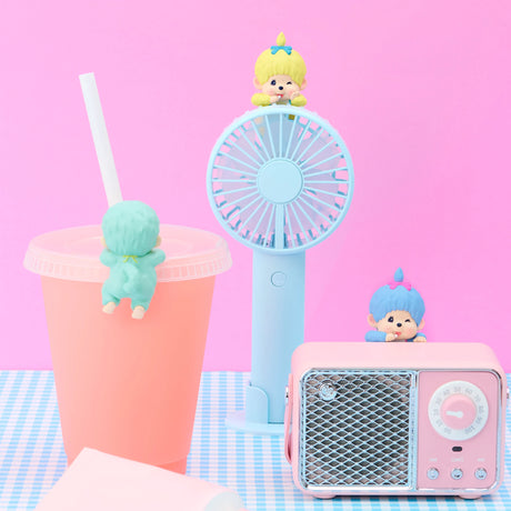 Mini hippers toy figures posed with a blue fan, cup, and pink radio