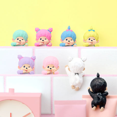Assorted mini hippers toy figures displayed on pastel tiered shelves